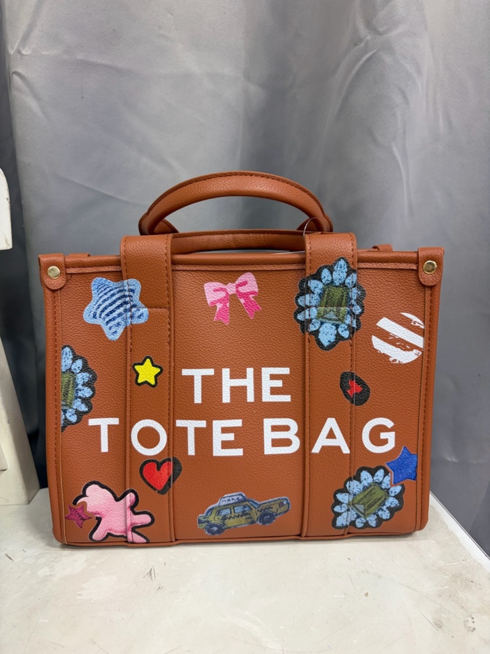 Brown Tote with Decorative Patches
